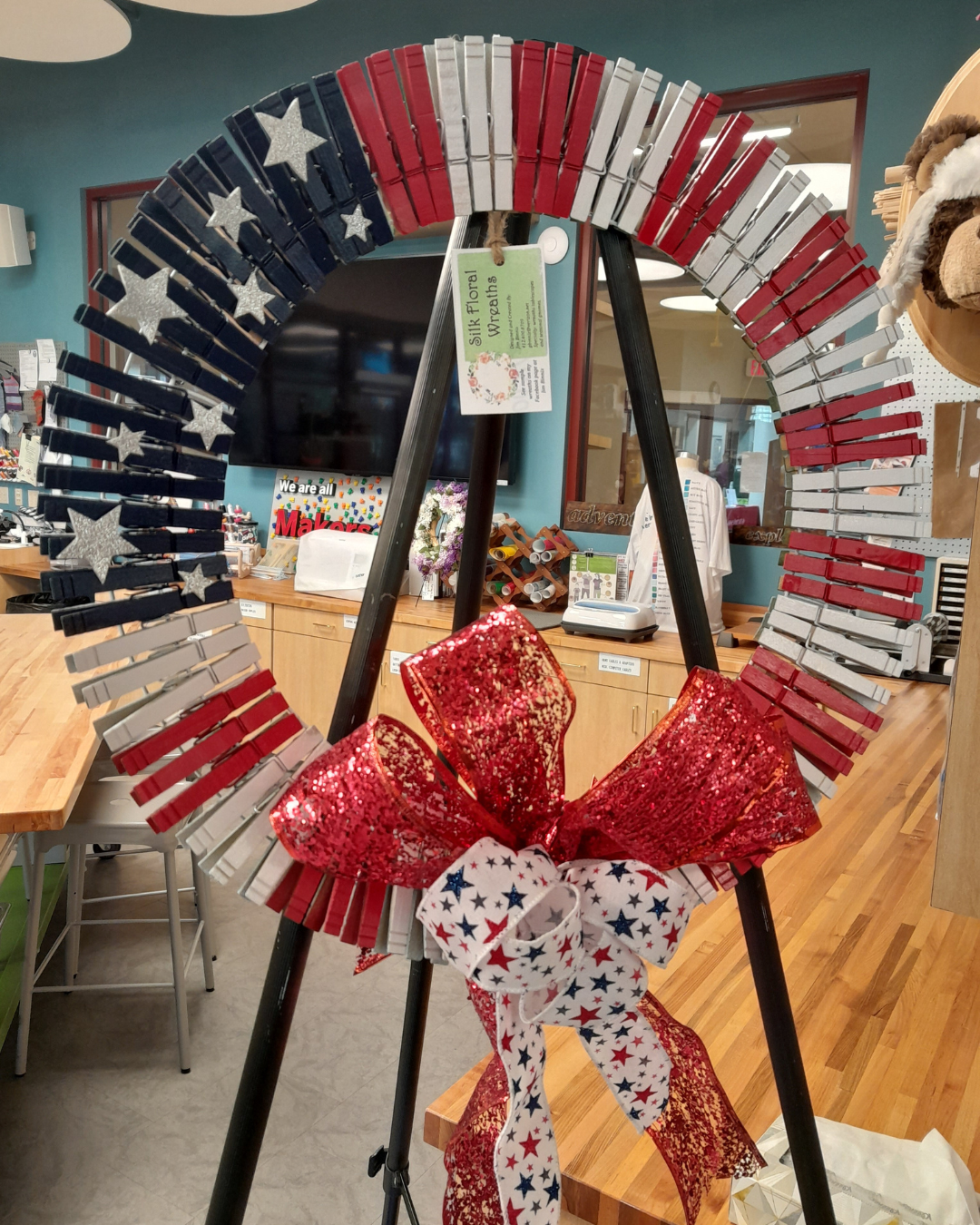Photo of a wreath made out of red, white, and blue clothespins 