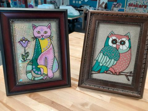 Acrylic paintings of a cat and an owl