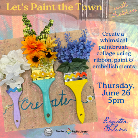 Three colorful paint brushes adorned with flowers and ribbon